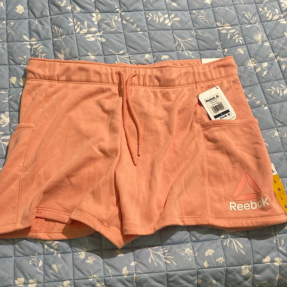 10 dollars for both. Shorts from Reebok brand new.